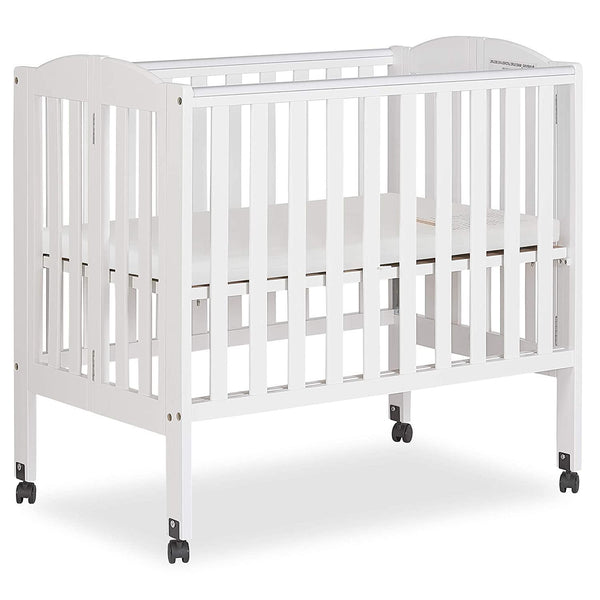 Dream on Me 2 - in - 1 Folding Portable Mini Crib in White. Mattress Pad Included. Easy to Fold and Store Baby Crib. Two Adjustable Mattress Height Positions Convertible Crib